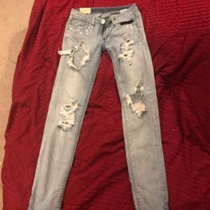Machine ripped jeans